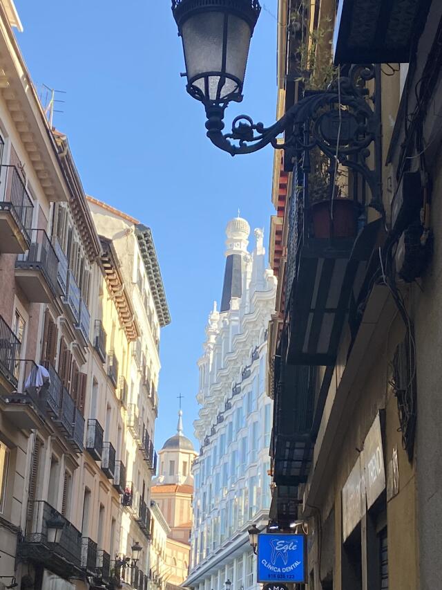 Spanish street with old lighting and buildings