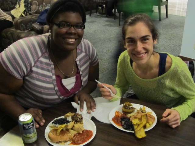 Two students sampling Latin food at Salsa and Soul Food
